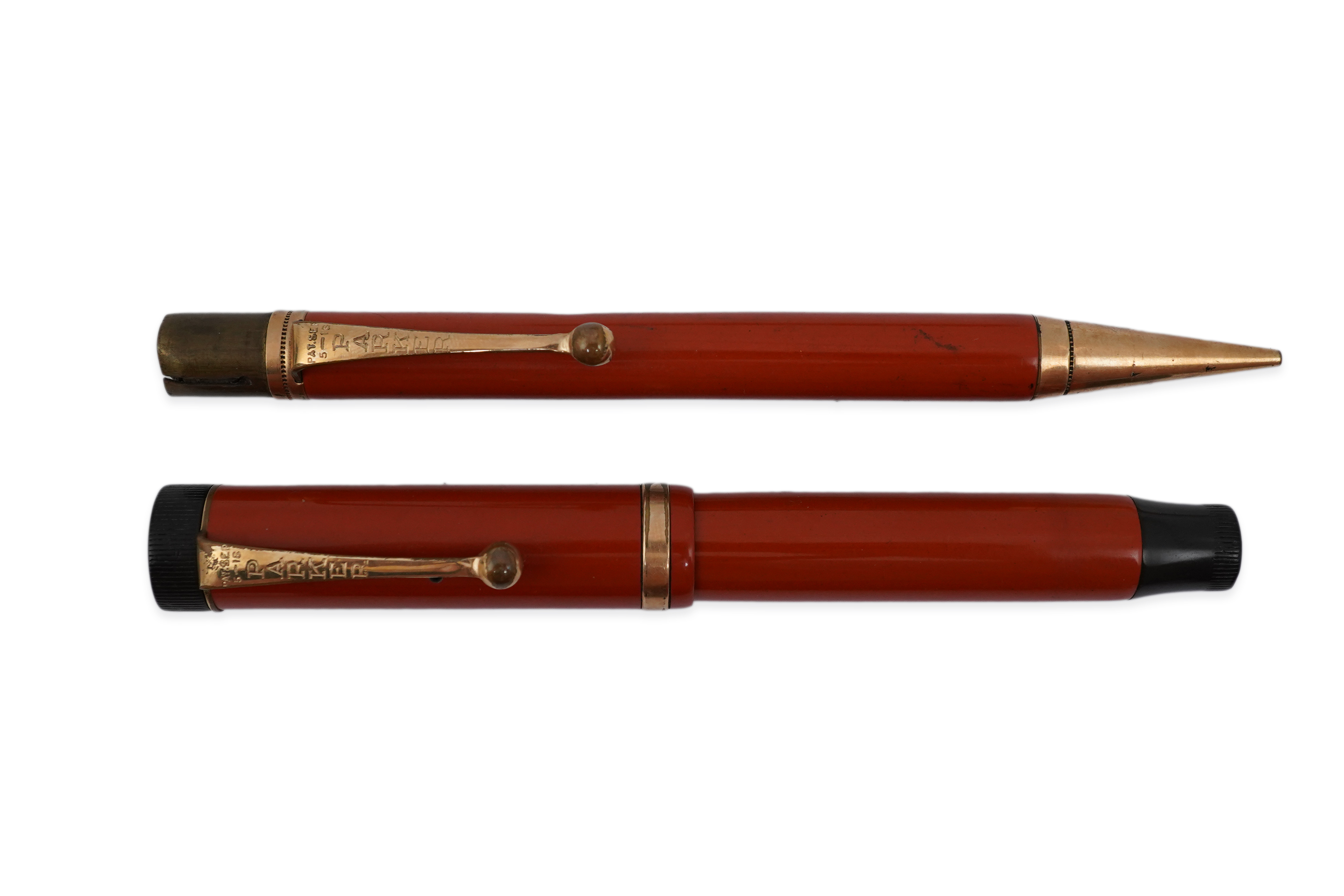 A Parker Duofold Lucky Curve fountain pen, and matching propelling pencil. Condition - poor